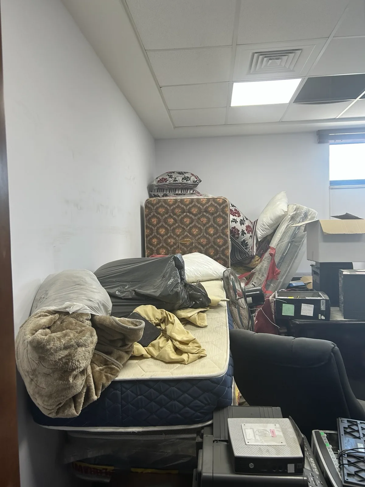 Interior room at Sama Pharmaceuticals arranged with bedding.